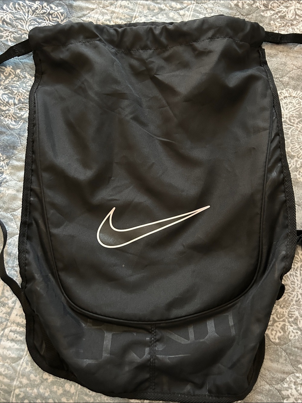 Nike Black Drawstring Backpack with White Swoosh